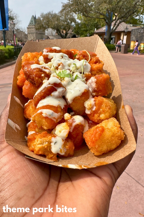 refreshment port plant-based buffalo chicken tender poutine flower and garden festival epcot