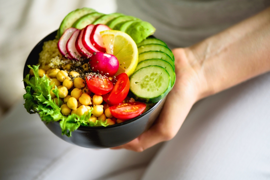 dietary options at lake compounce
vegan bowl of vegetables with cucber, radishes, lemon, roma tomatoes, chickpeas, lettuce, and chia seeds